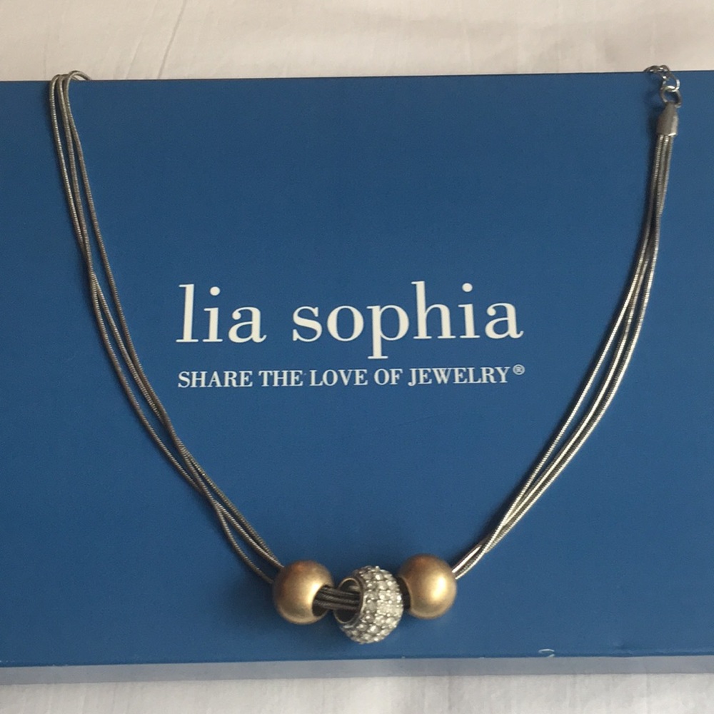 Three strand necklace with beads